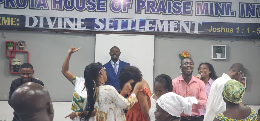 Church members in worship during a service.