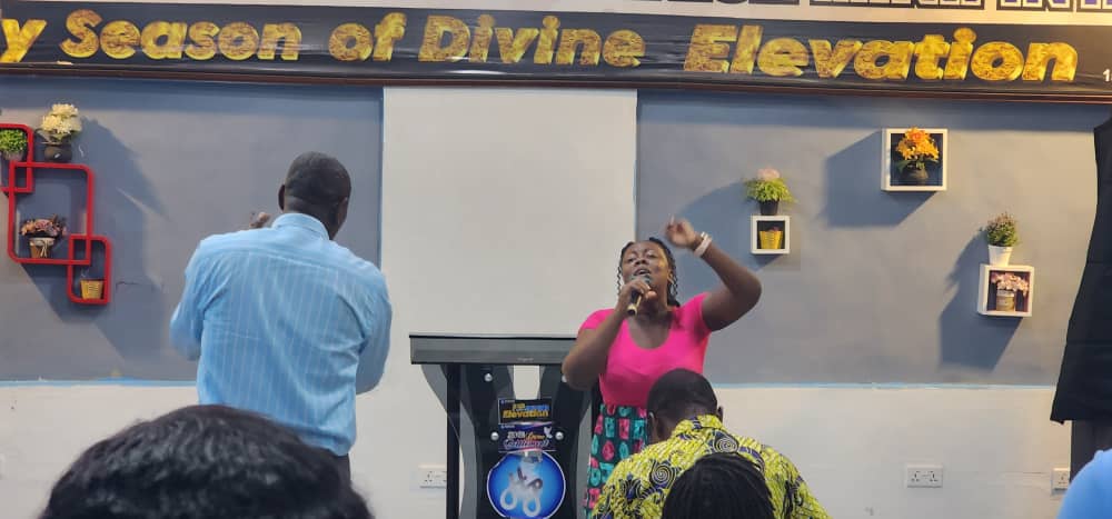 Worship moment during church service.